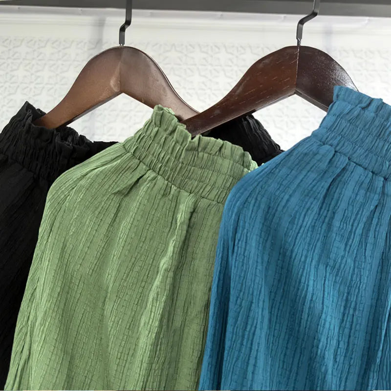 Coloris noir, vert sauge et bleu canard de la jupe longue